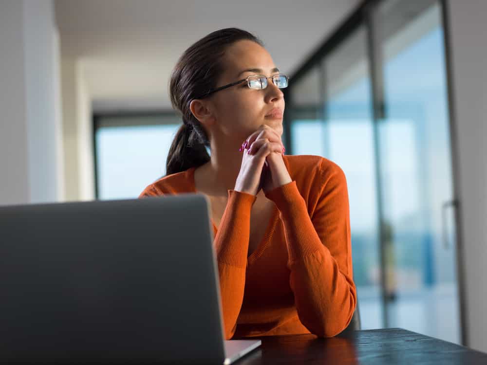 young business woman working on laptop computer at modern home office-2